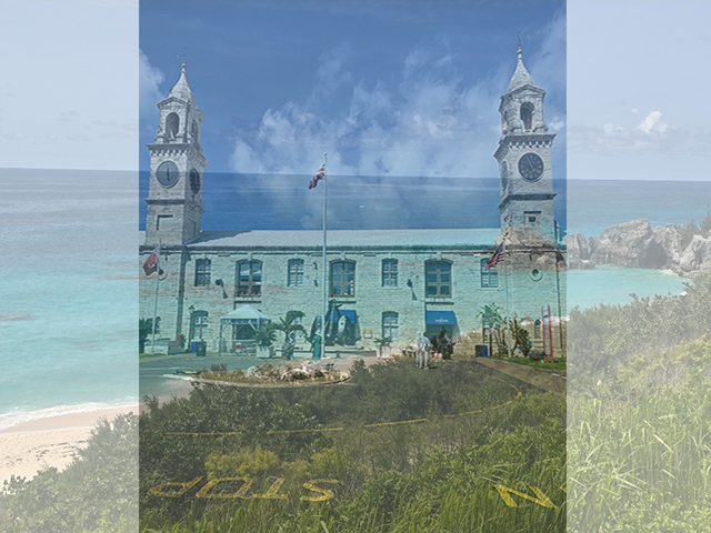 Photo of Royal Naval Dockyard and a beach faded in the background Photo of Royal Naval Dockyard and a beach faded in the background